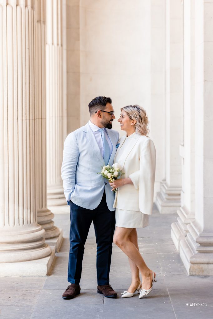 a natural moment captured by destination wedding photographer of bride and groom in Malaga Town Hall during their wedding