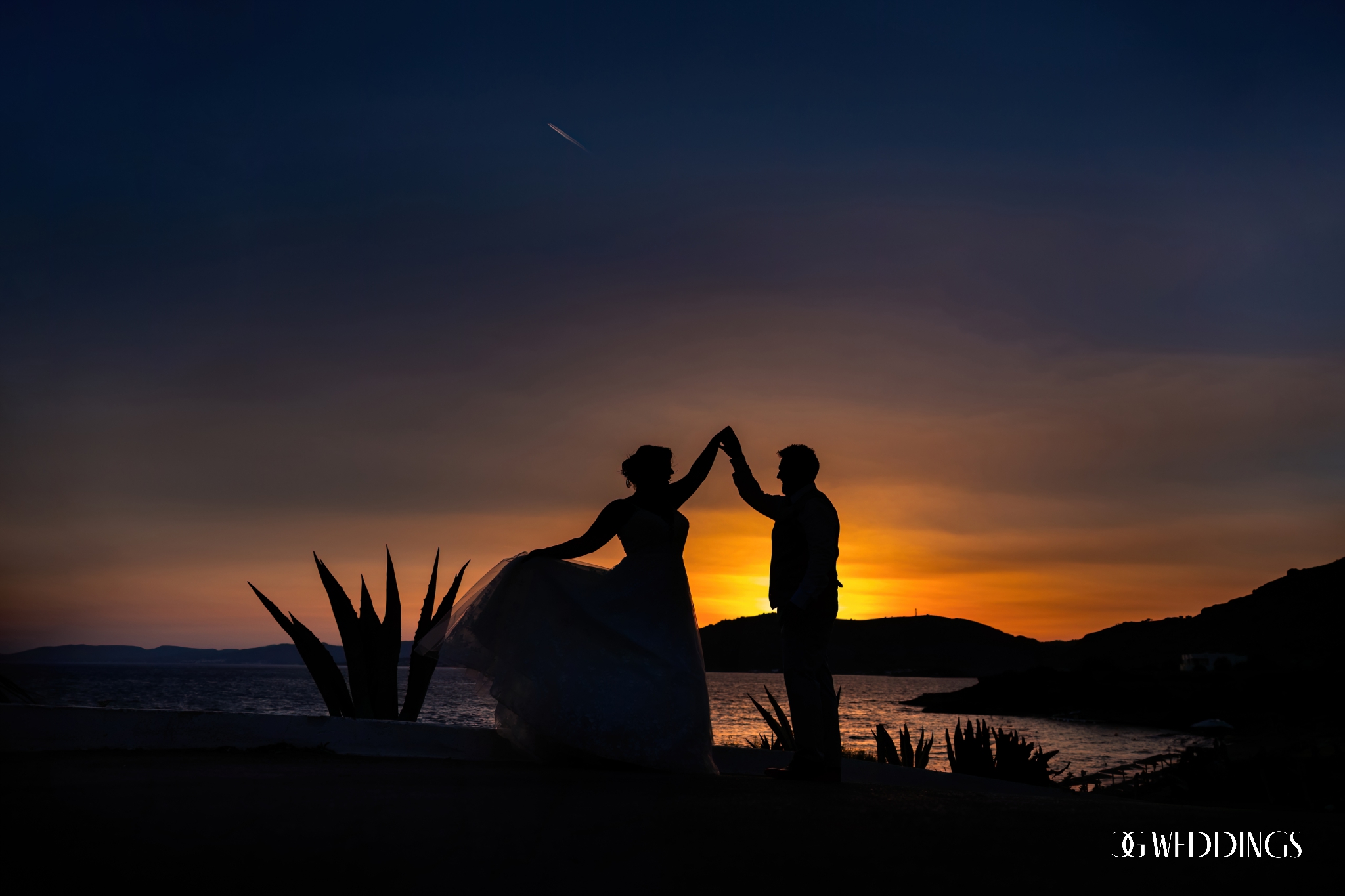 bride and groom dancing in the sunset in Marbella photographerd by Chuck from CG weedings