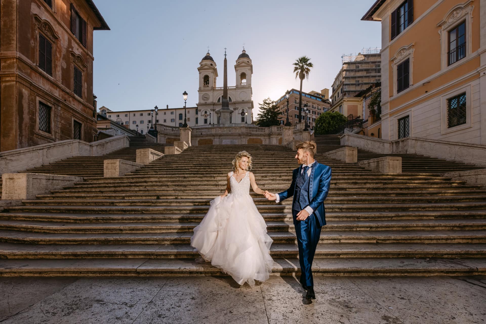 Wedding couple on iconic Spanish steps in Marbella, Spain, captured by a professional Spain wedding phhotographer