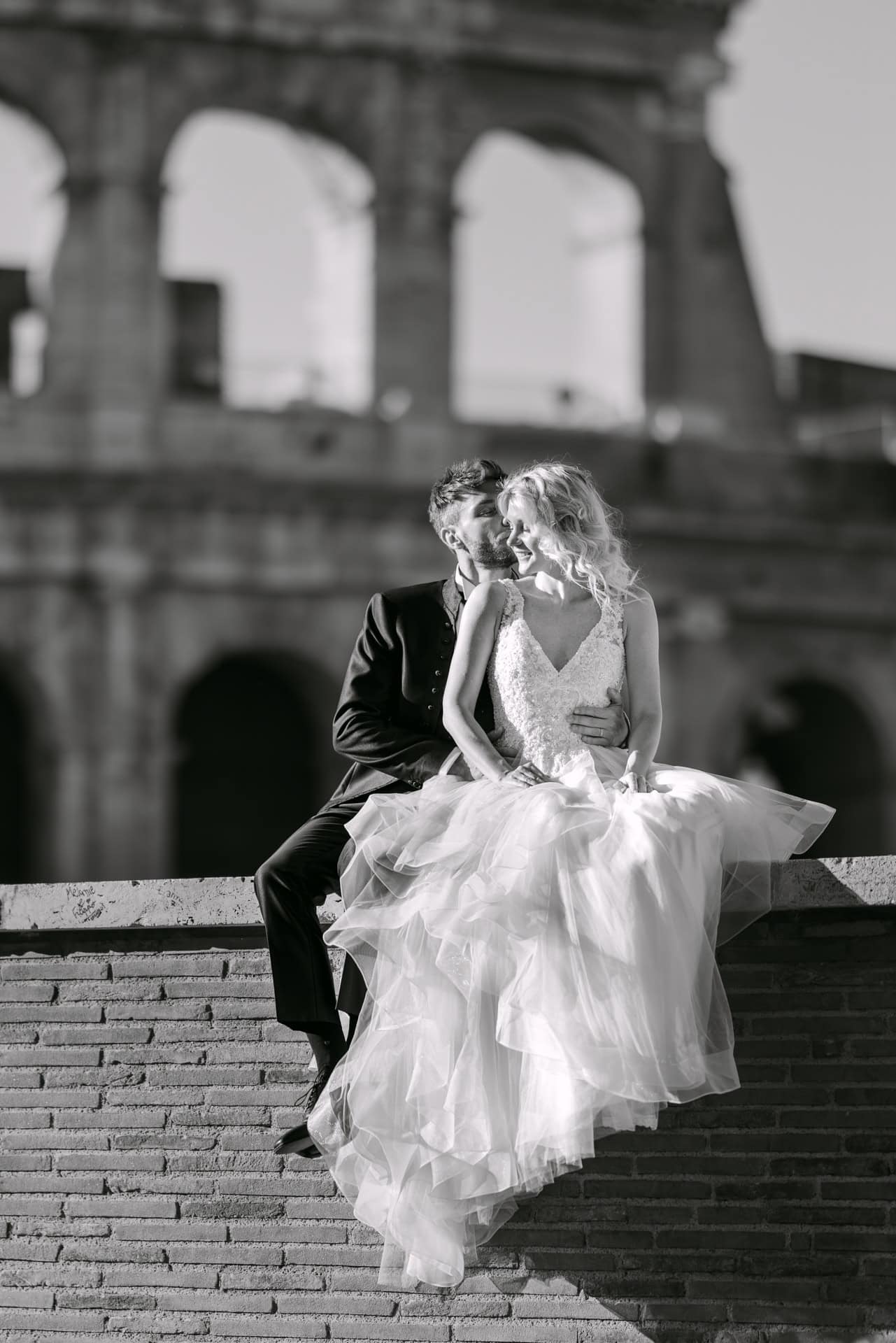 Bride and groom at the Colosseum, Rome